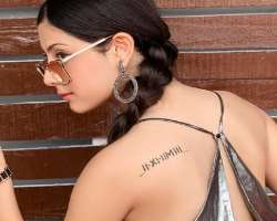 The actress loves tattoos and has engraved one on her back. 